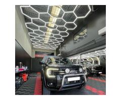 Enhancing Garage Paint Correction with Hex LED Automotive Work Lighting Systems